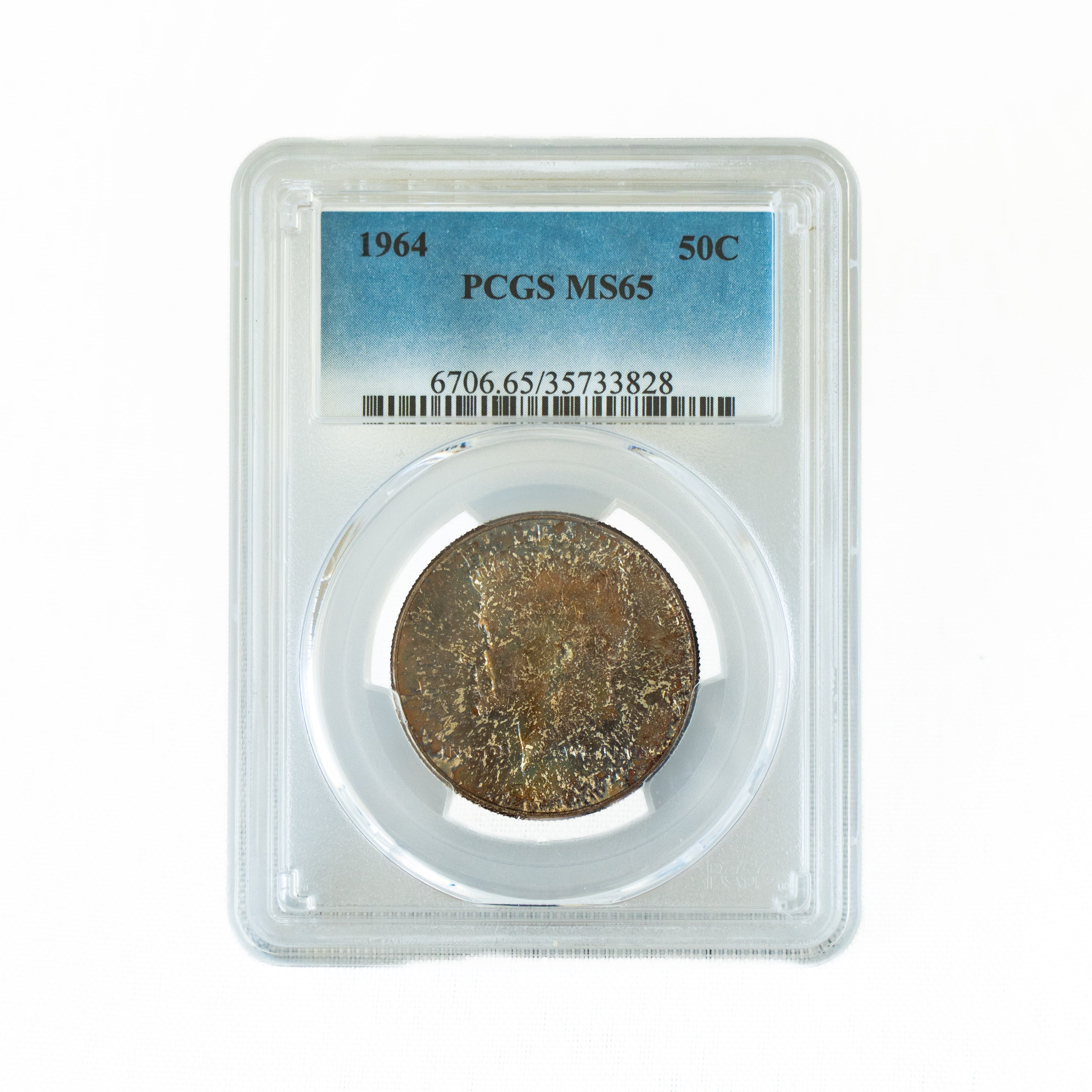 1964 $0.50 Toned Kennedy Half Dollar - PCGS MS65