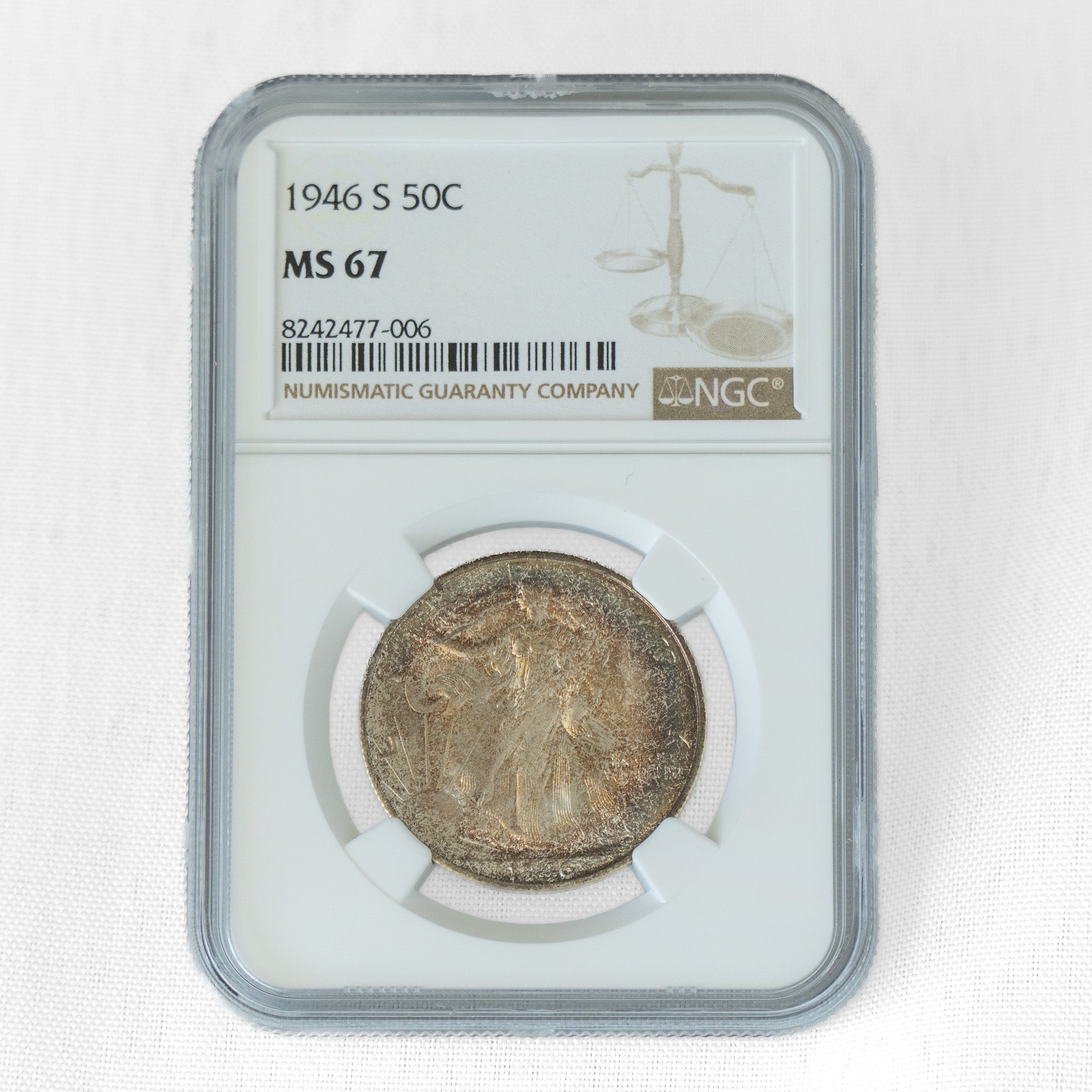1946 $0.50 Toned Walking Liberty Half Dollar S - NGC MS67