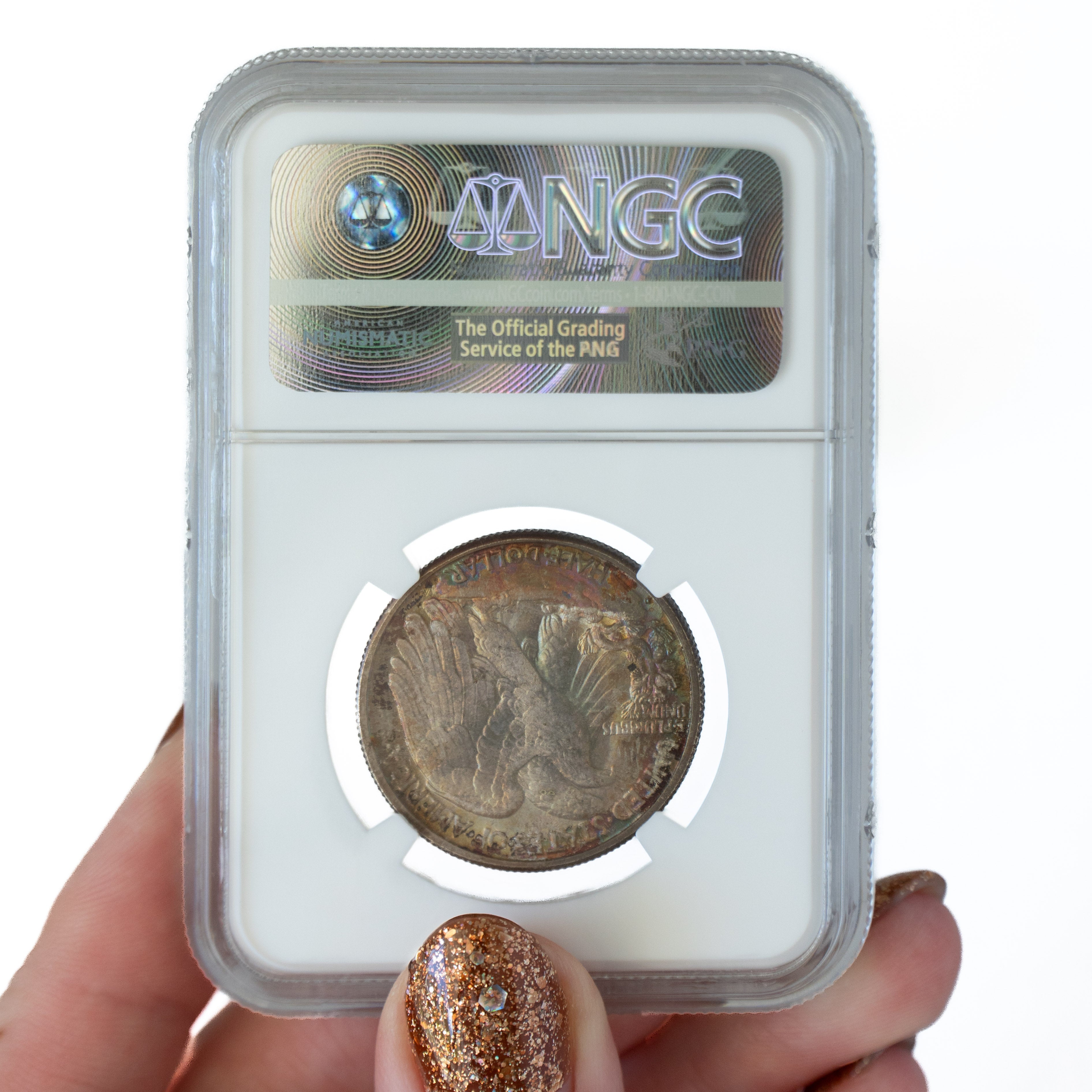 1946 $0.50 Toned Walking Liberty Half Dollar D – NGC MS67