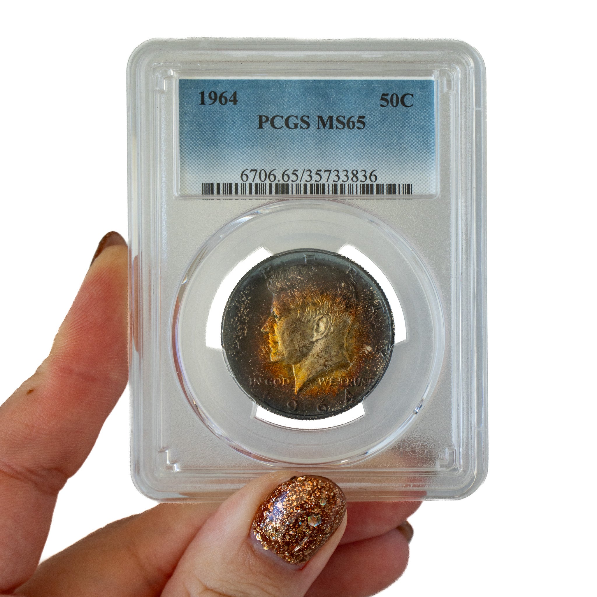 1964 $0.50 Toned Kennedy Half Dollar - PCGS MS65