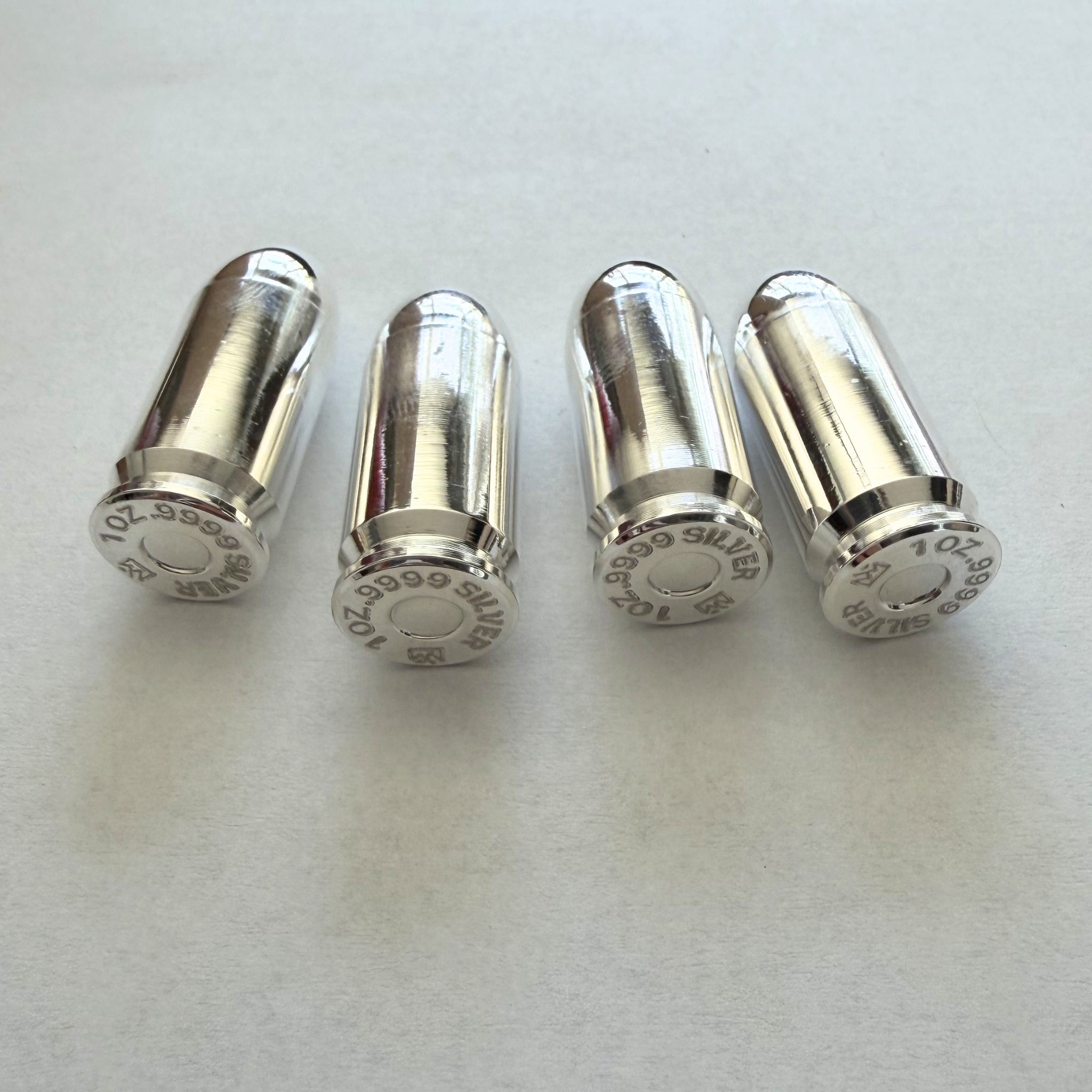 Box of 10 - 1 oz Silver Bullet Replica, .9999 Fine Silver, .45 Caliber, Frontier Mint Raw