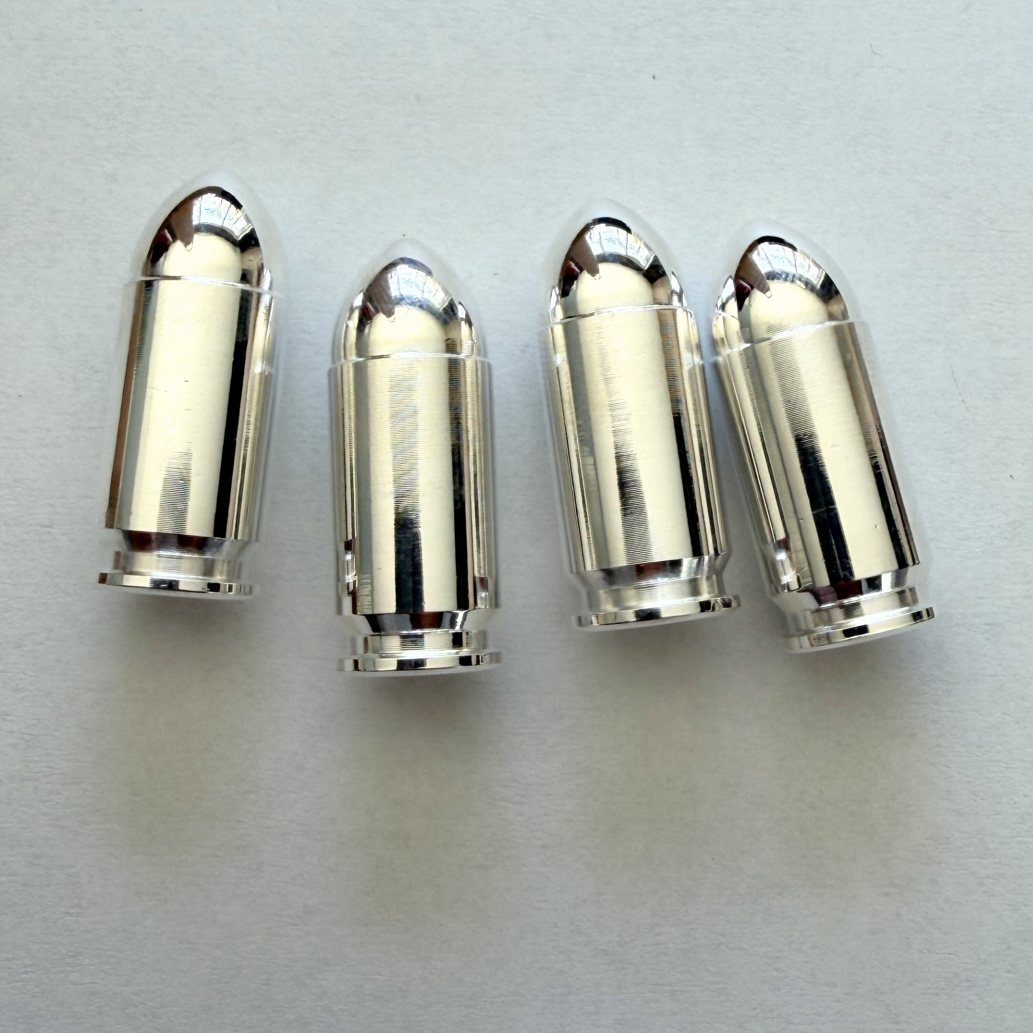 Box of 10 - 1 oz Silver Bullet Replica, .9999 Fine Silver, .45 Caliber, Frontier Mint Raw
